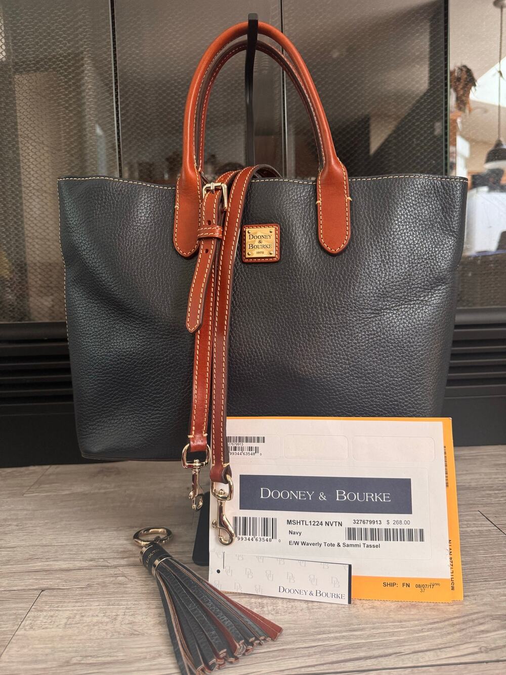 Dooney & Bourke navy East West Waverly tote w Sami charm